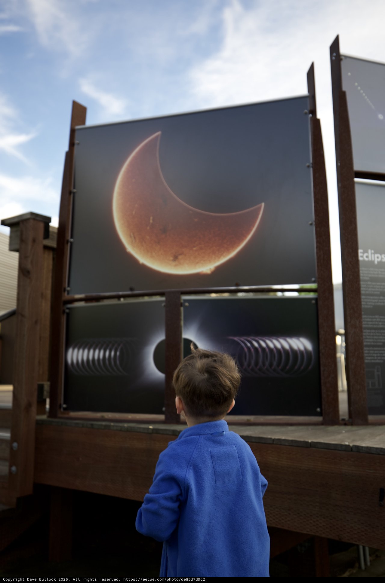 Child Observing Solar Eclipse Educational Display