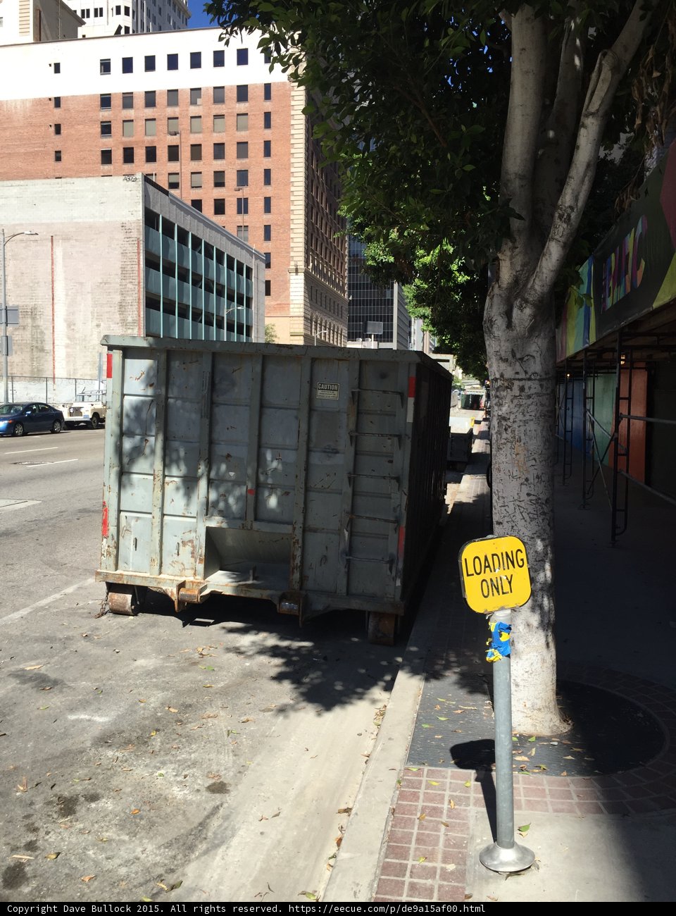 Abandoned Dumpster on City Street