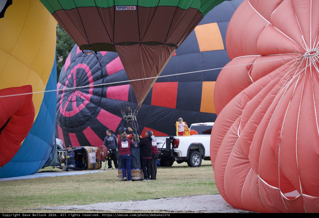 Ground Crew Prepares Hot Air Balloons for Launch