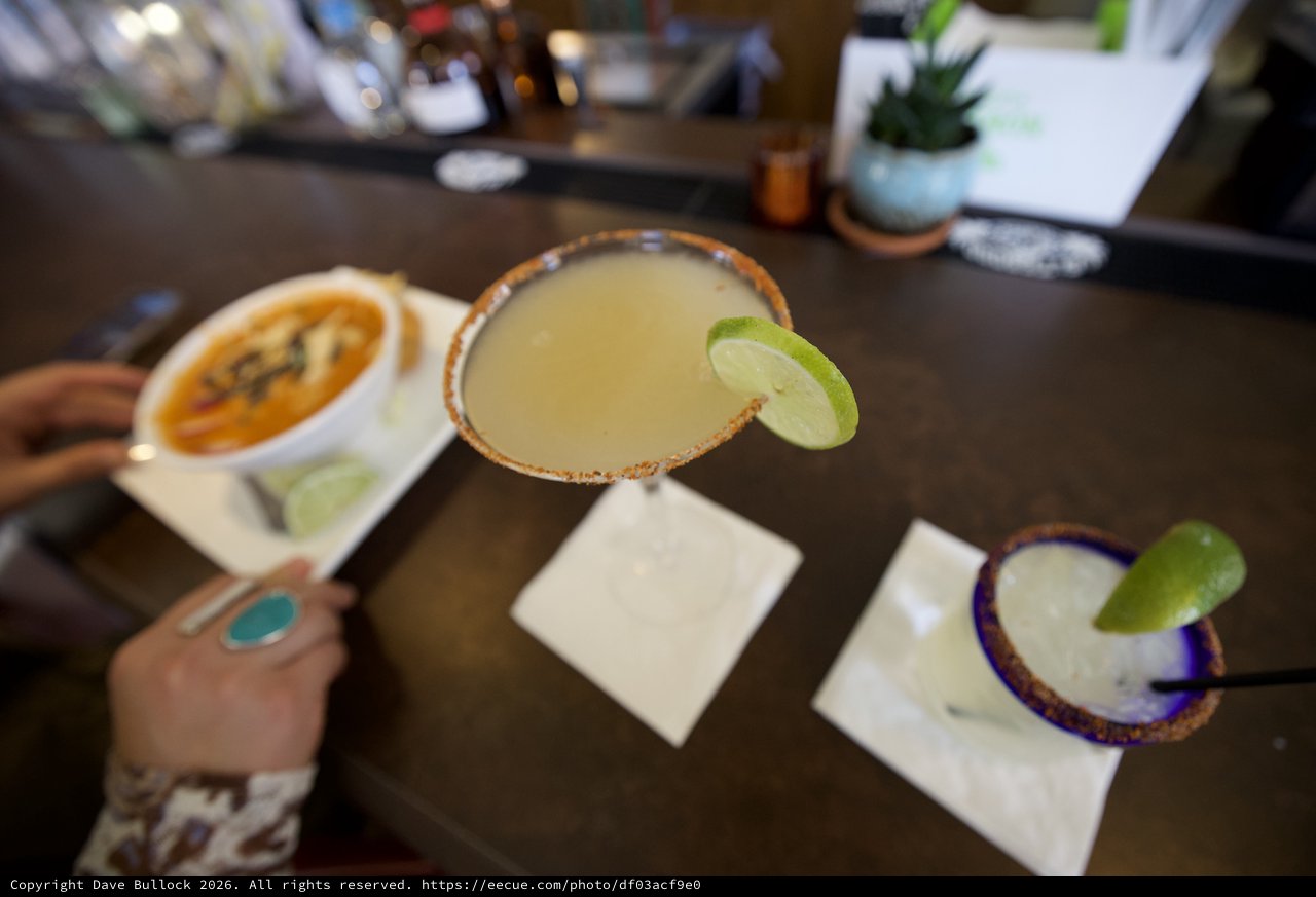 Margaritas and Mexican Cuisine at Restaurant Table