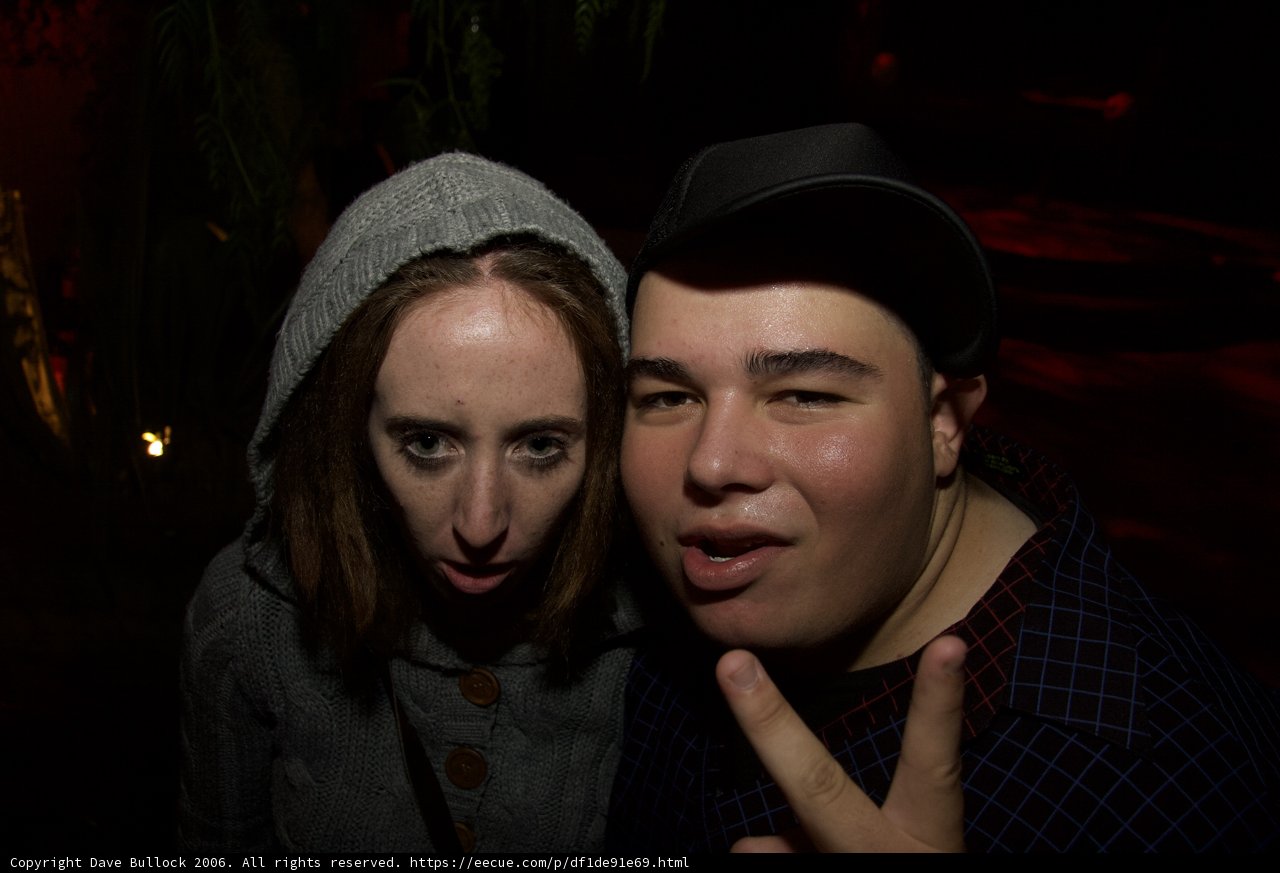 Nighttime Portrait of Couple in Hats