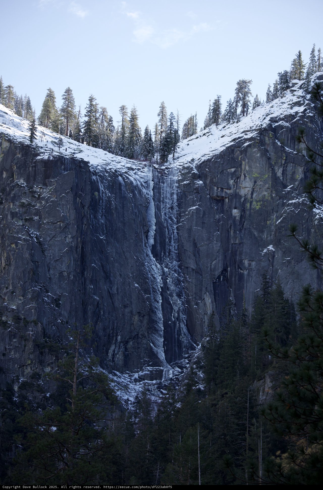 Frozen Waterfall Cascading Down Yosemite's Granite Cliffs