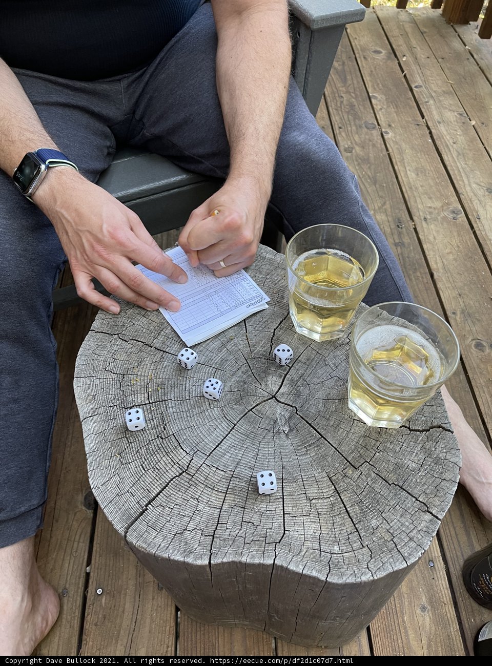 Dice Game on a Wooden Deck