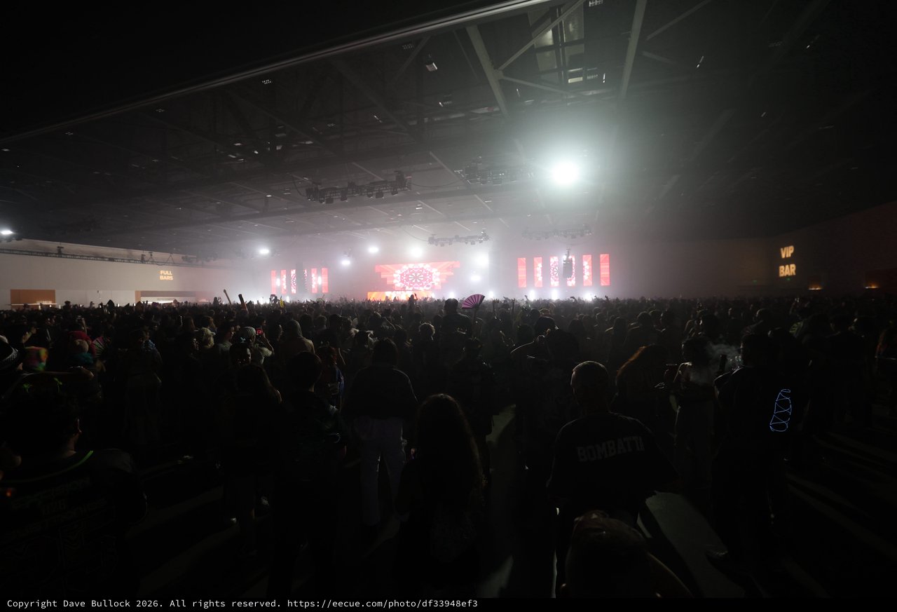 Massive Crowd Surges Toward Glowing EDM Festival Stage