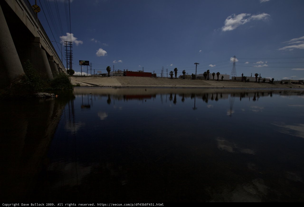 Blue Skies and Power Lines over the River