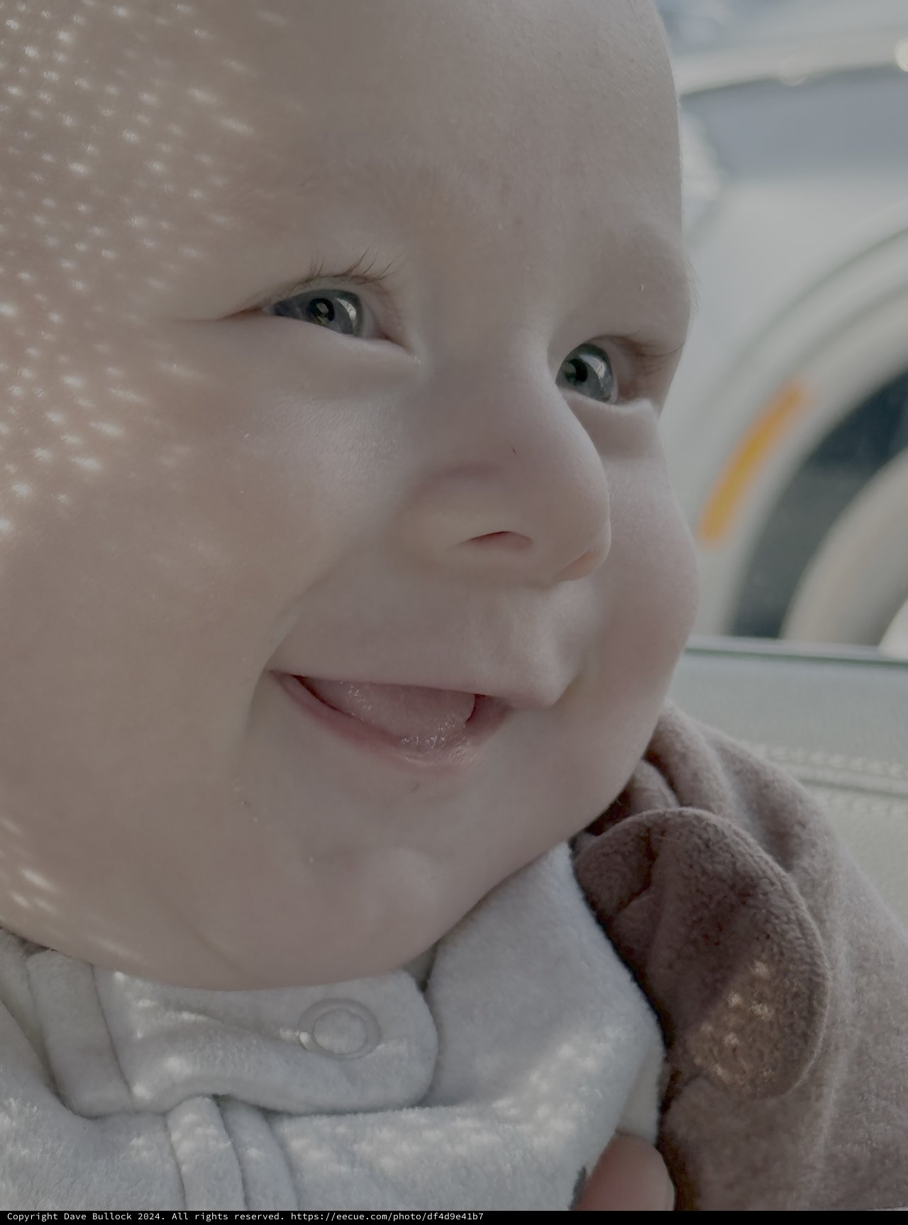 Innocent Baby Portrait with Bright Blue Eyes