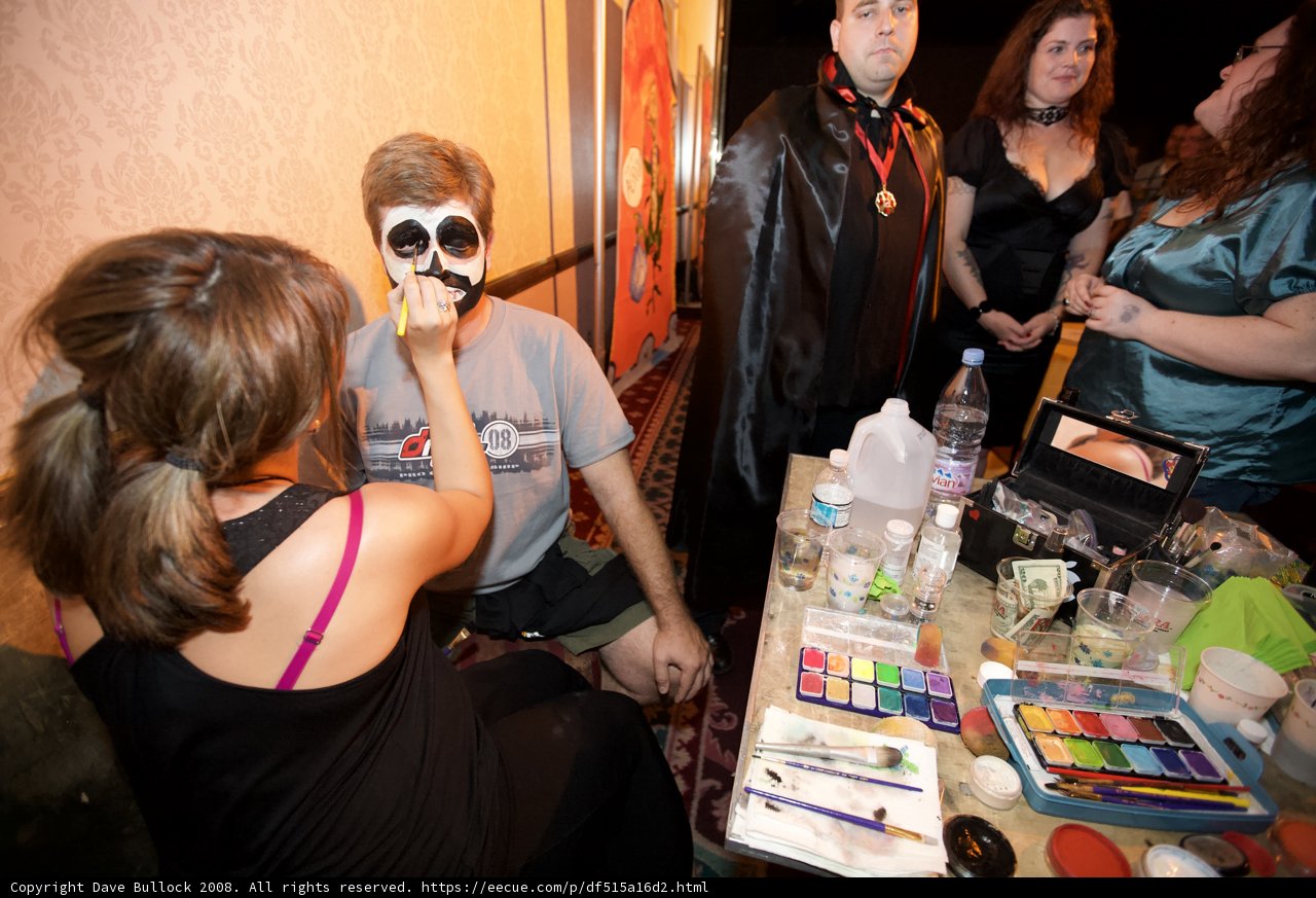 Skeleton-faced woman at festival