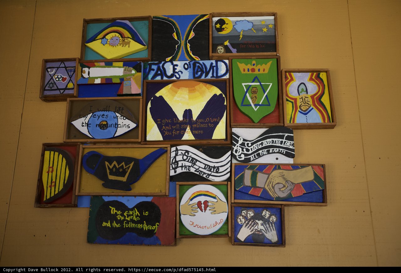 Artistic Collage on Plywood Wall