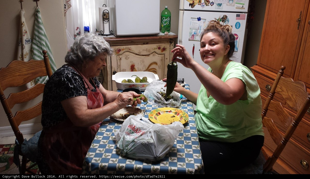 Women Enjoying a Meal at an Architecturally Stunning Dining Table