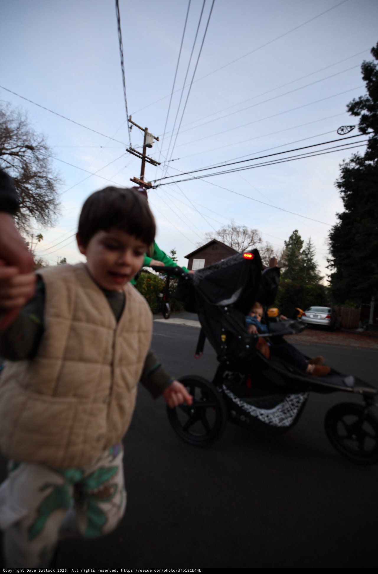 Children's Evening Bike Parade in Suburban Neighborhood