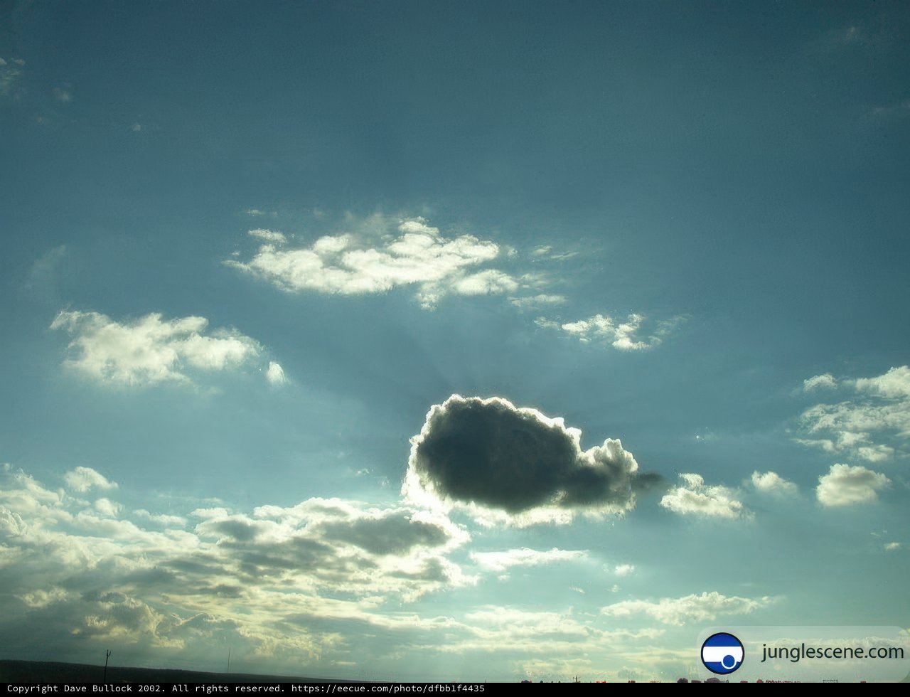 Cumulus Cloud with Sun Rays