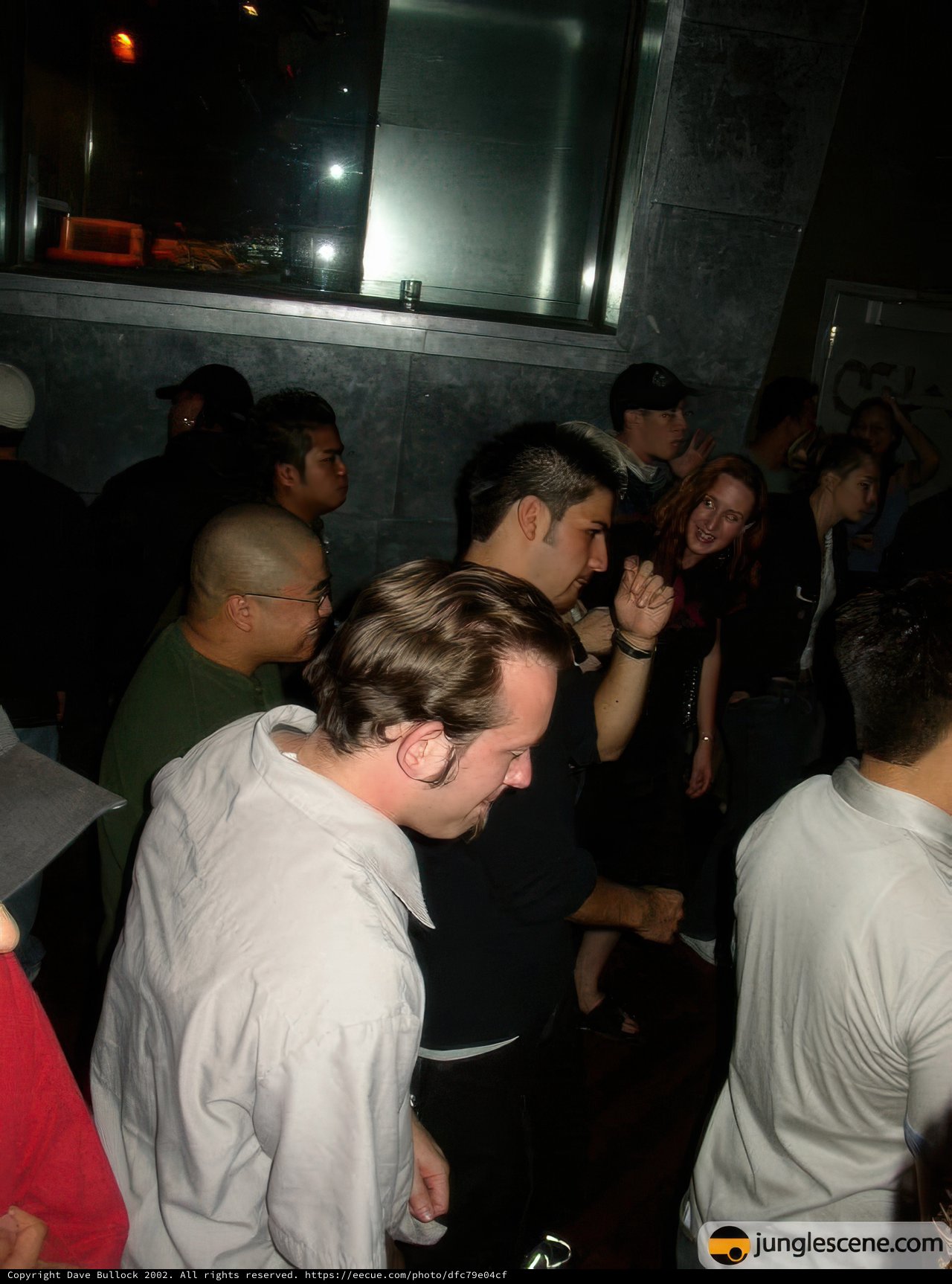 Nightclub Crowd Gathering around Table