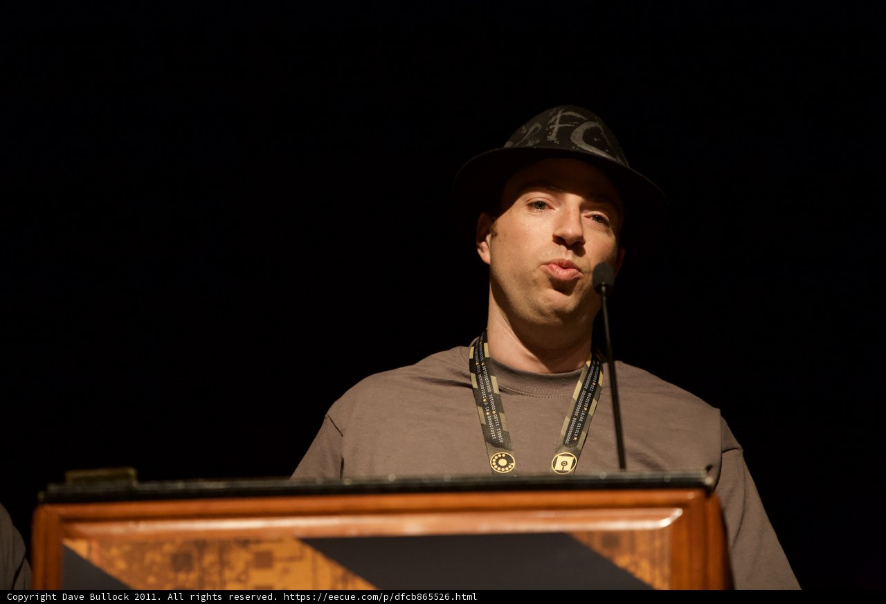 Sun Hat Man at the Podium