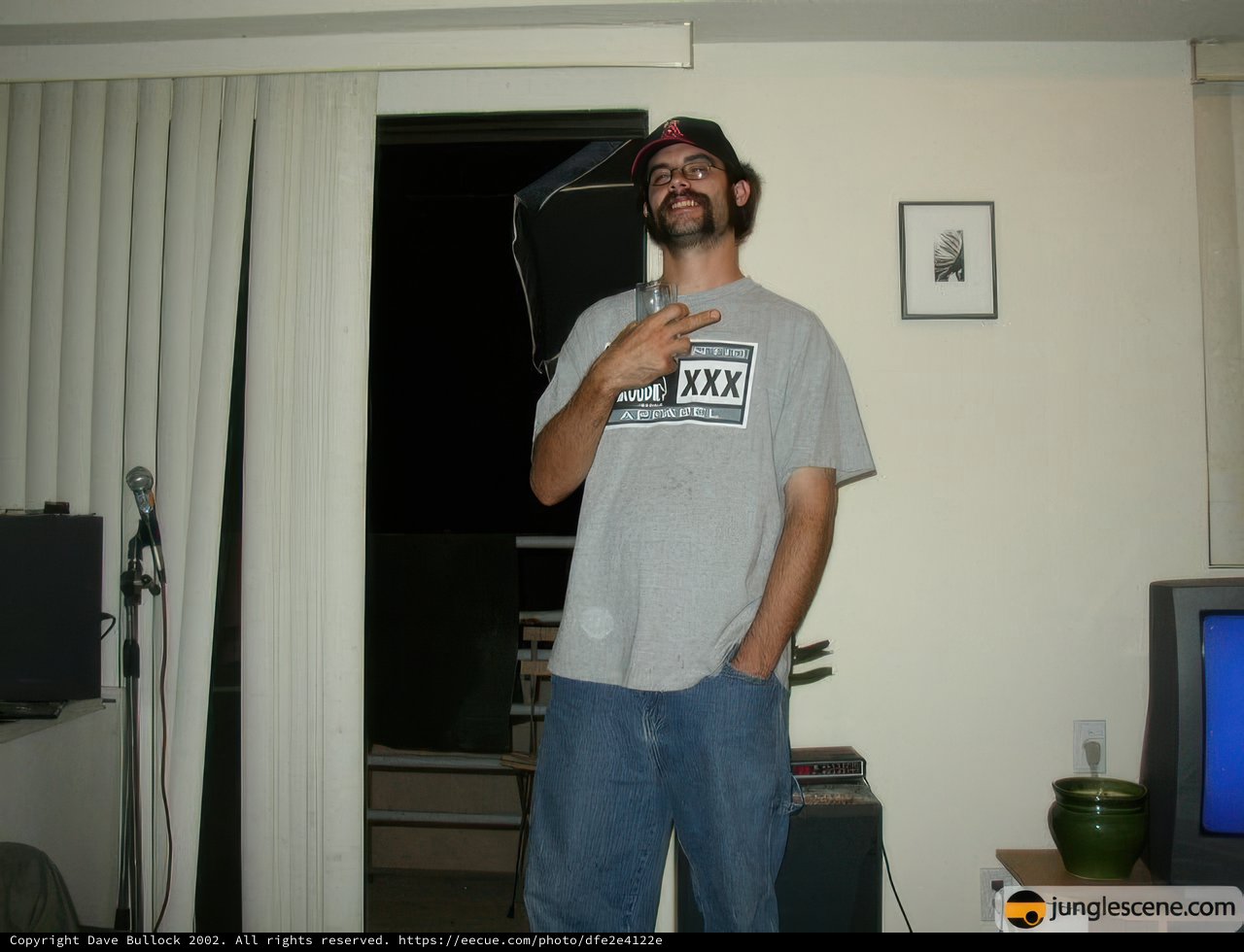 Portrait of a Man in a Technology-Filled Room