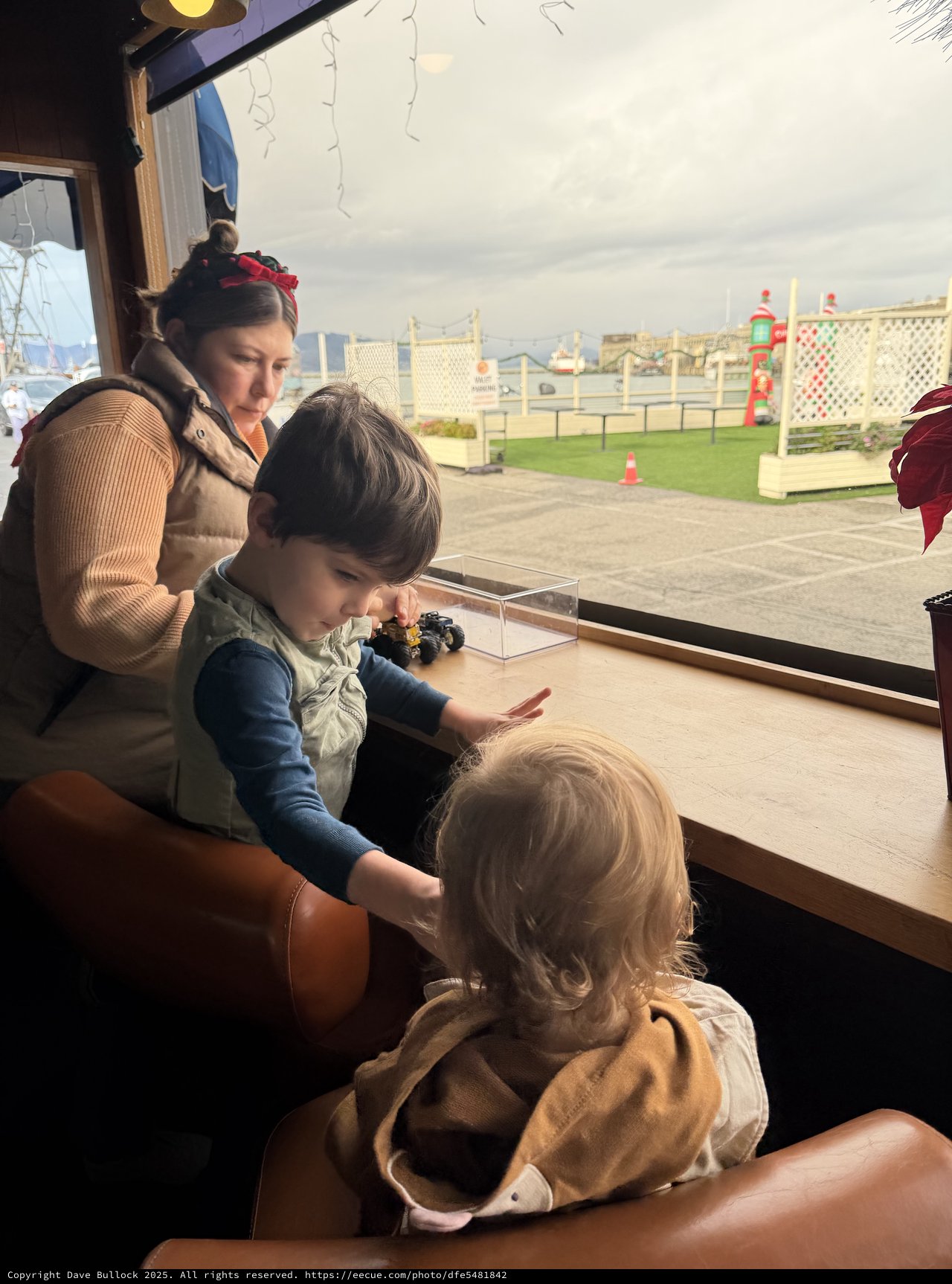 Children Learning Together at Museum Window Display