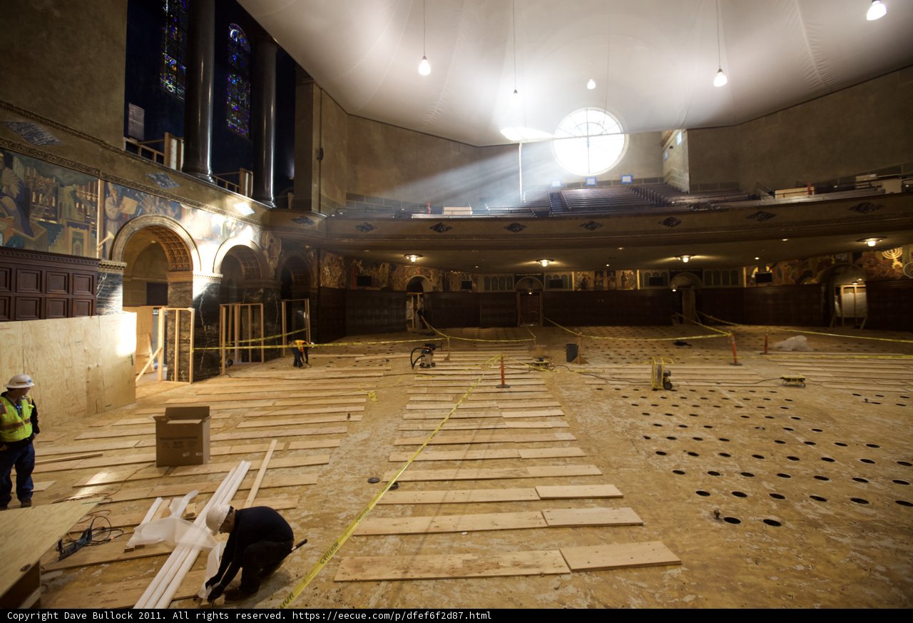 Illuminated Wood Flooring in a Spacious Room