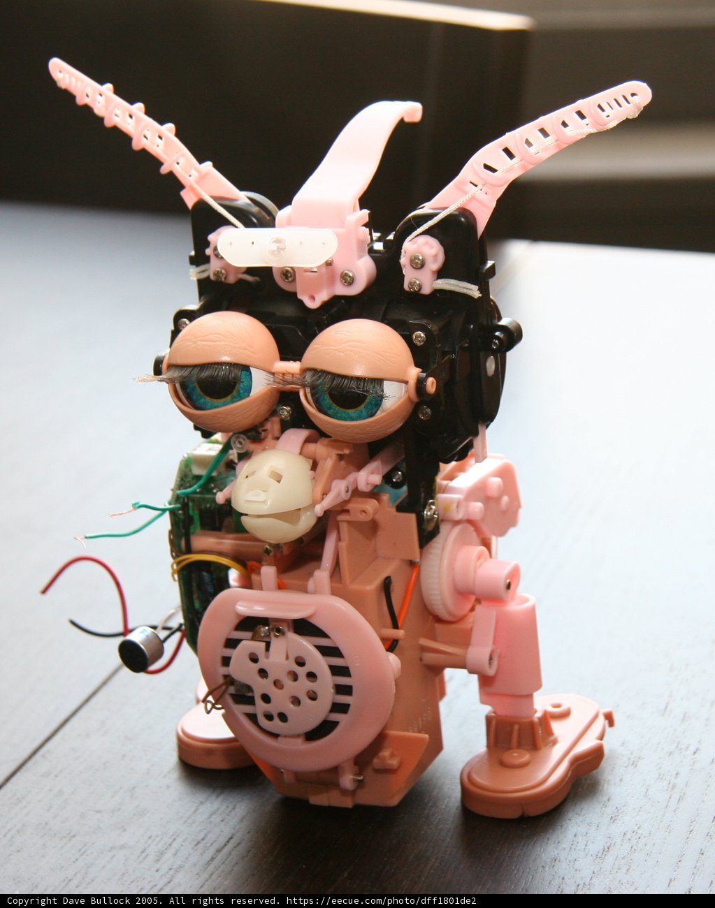 Pink-Eyed Toy Robot
