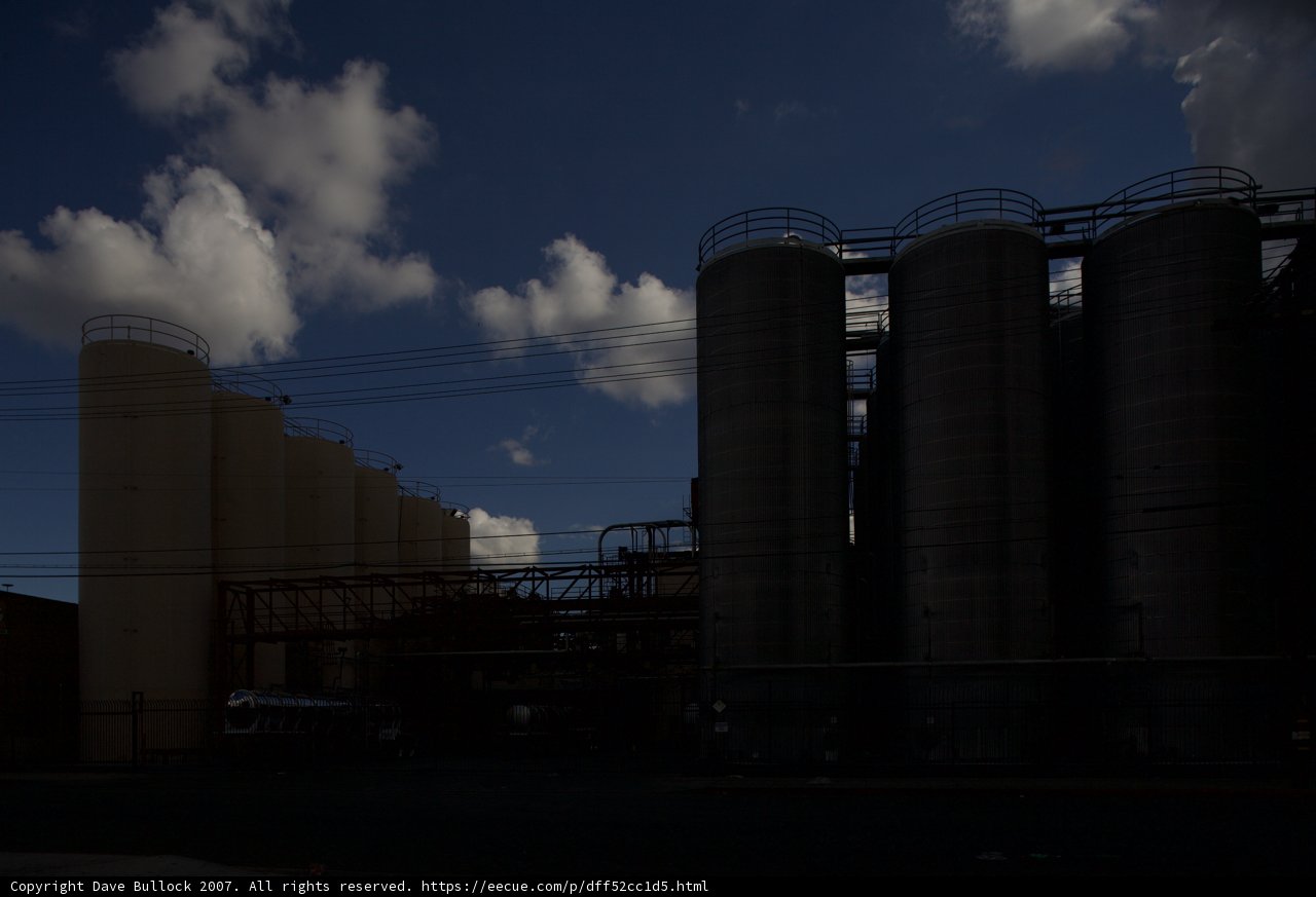Industrial Architecture Silhouetted Against a Blue Sky