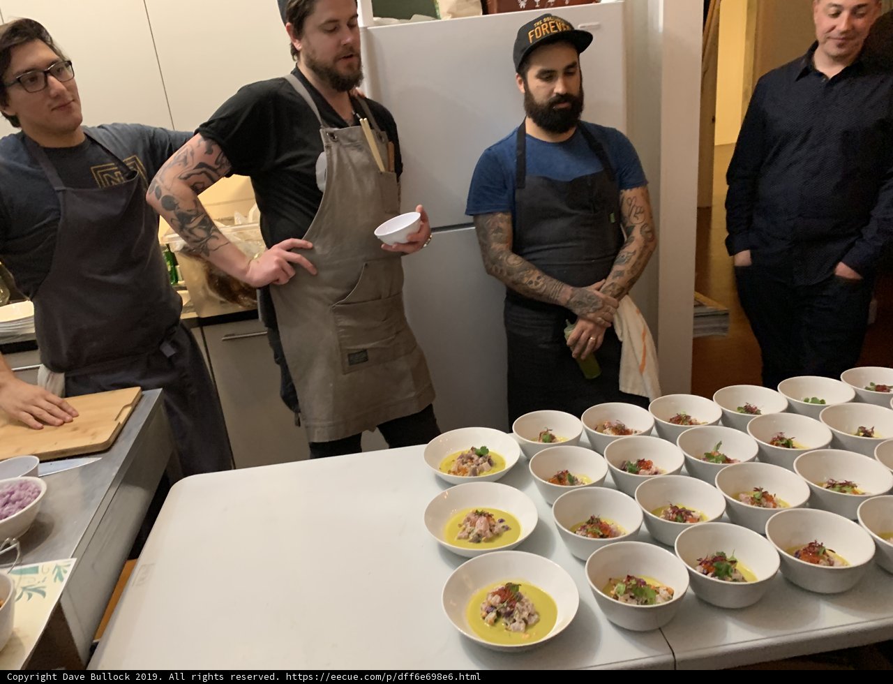 Men Enjoying A Delicious Meal Together