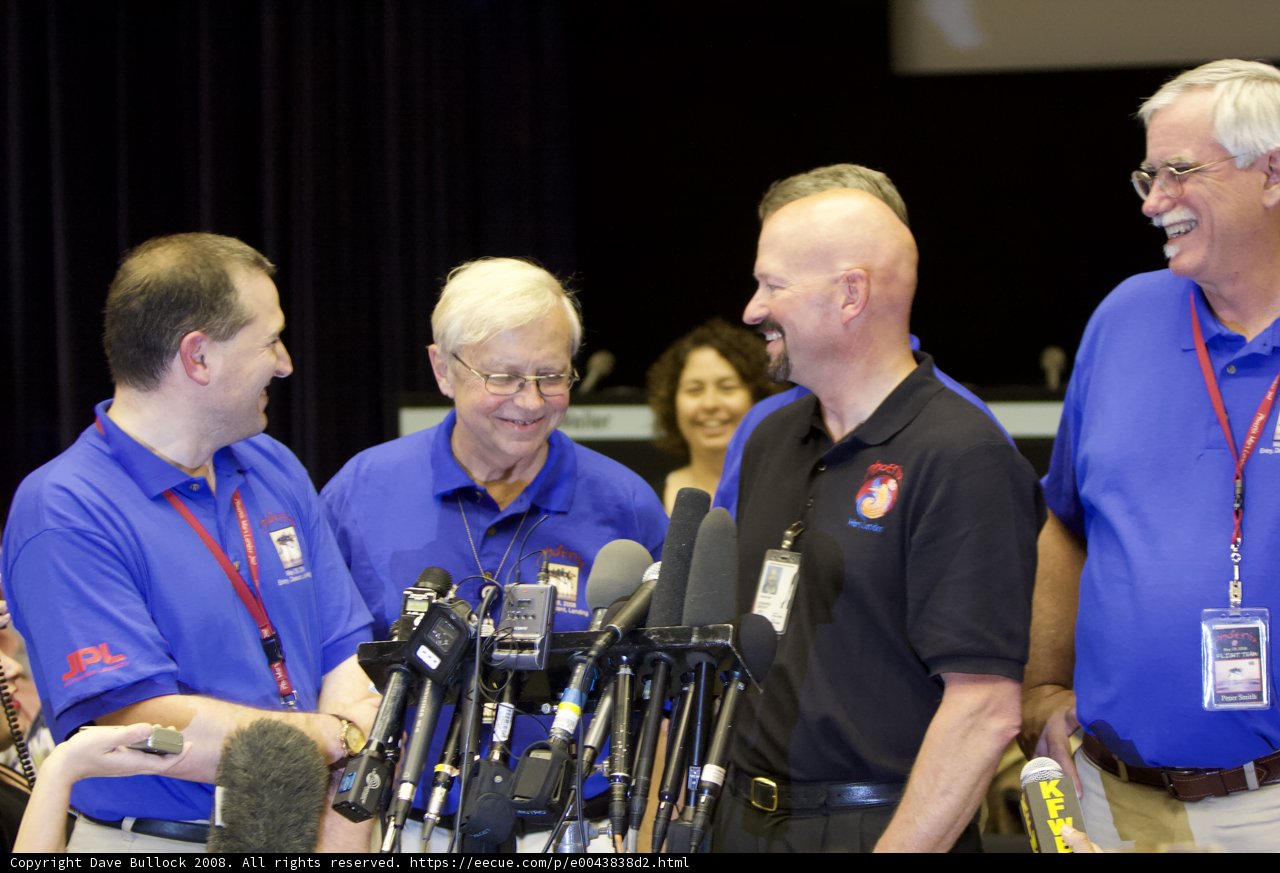 Press Conference with Blue-Shirted Men