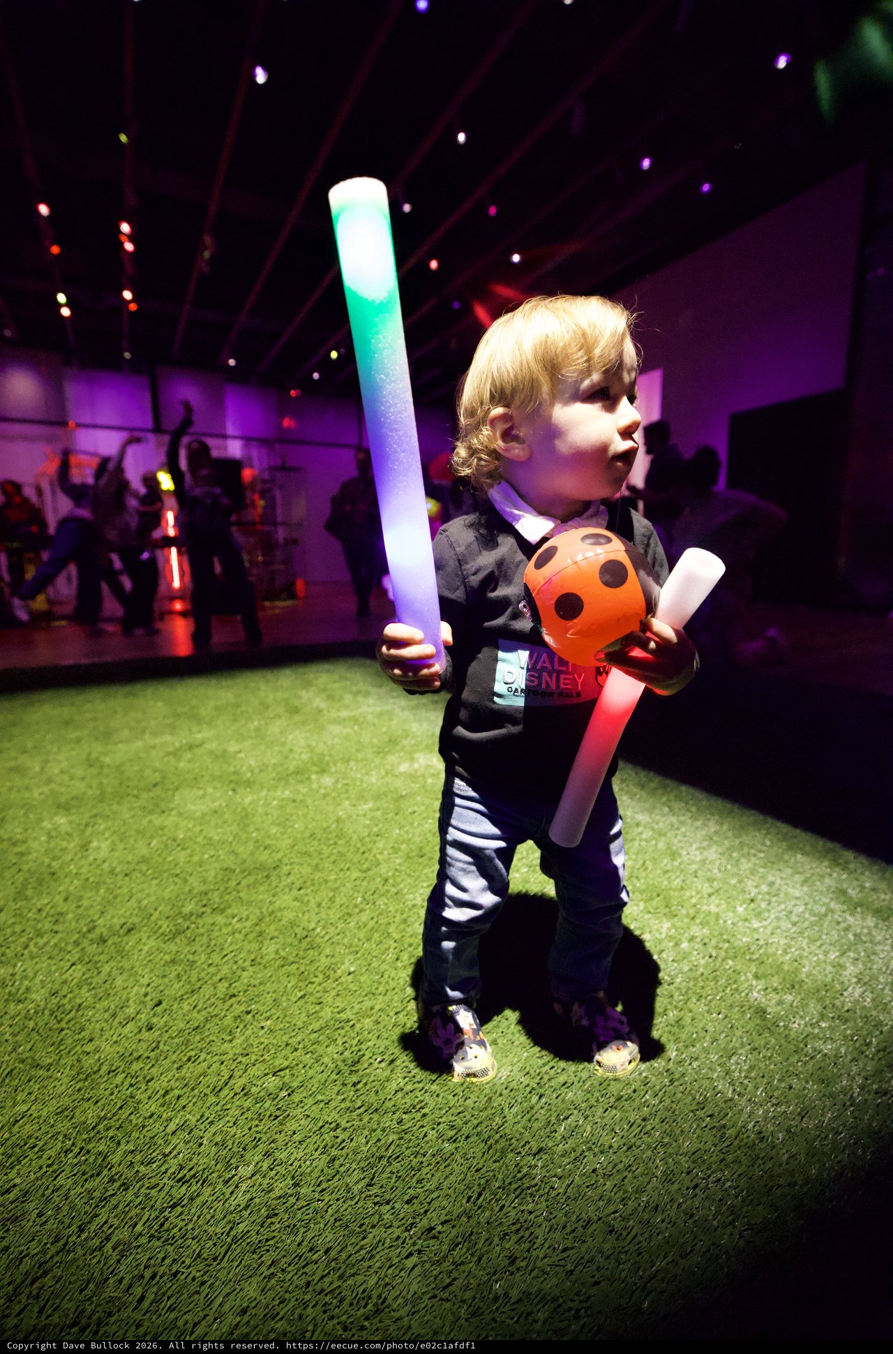 Young Child at Baby Rave Light-Up Event