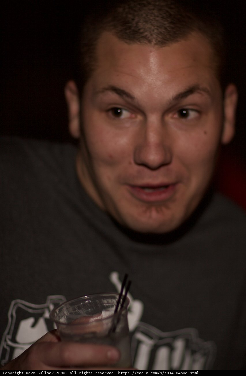 A Man Savoring a Cocktail