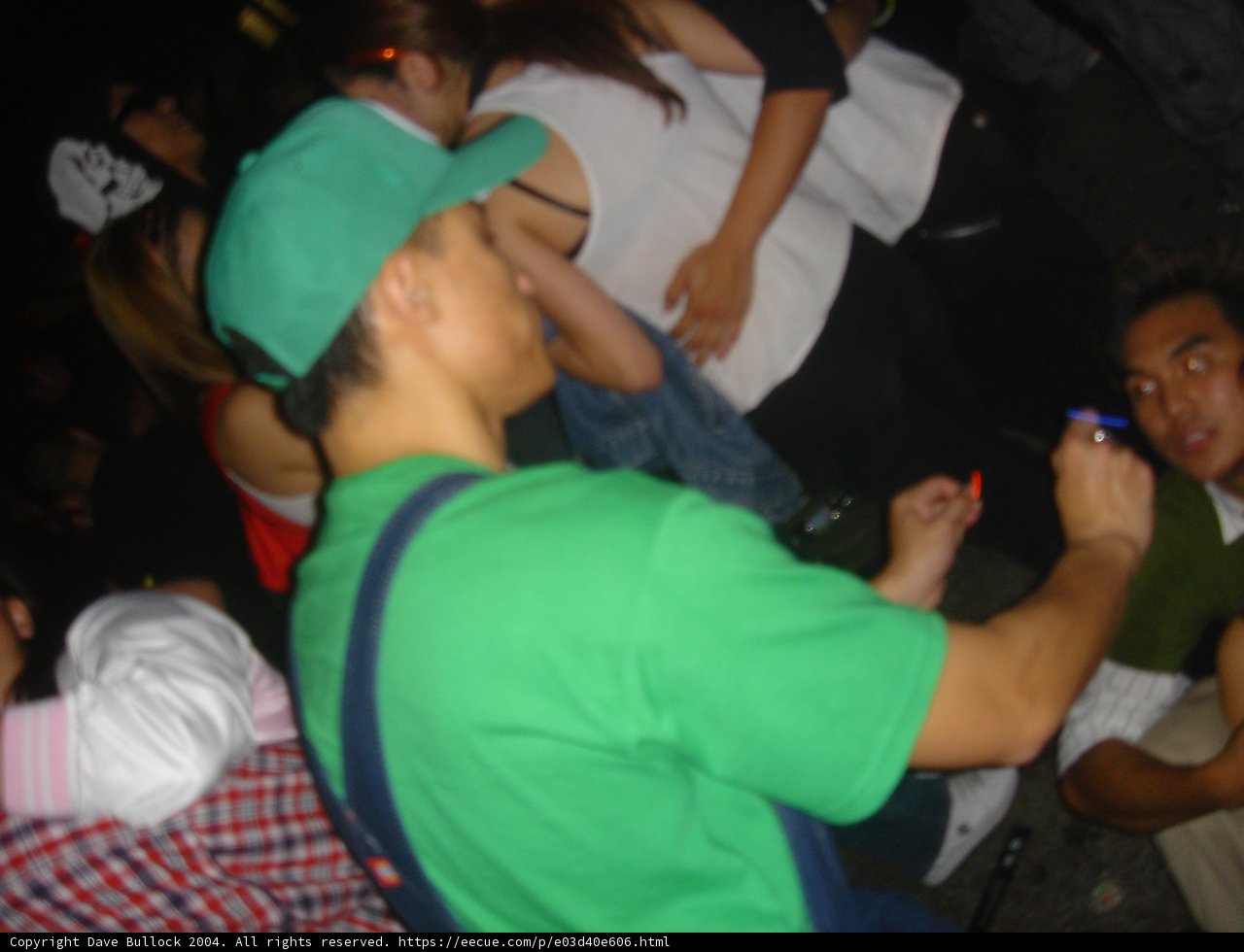 Green-Shirted Man at the Club