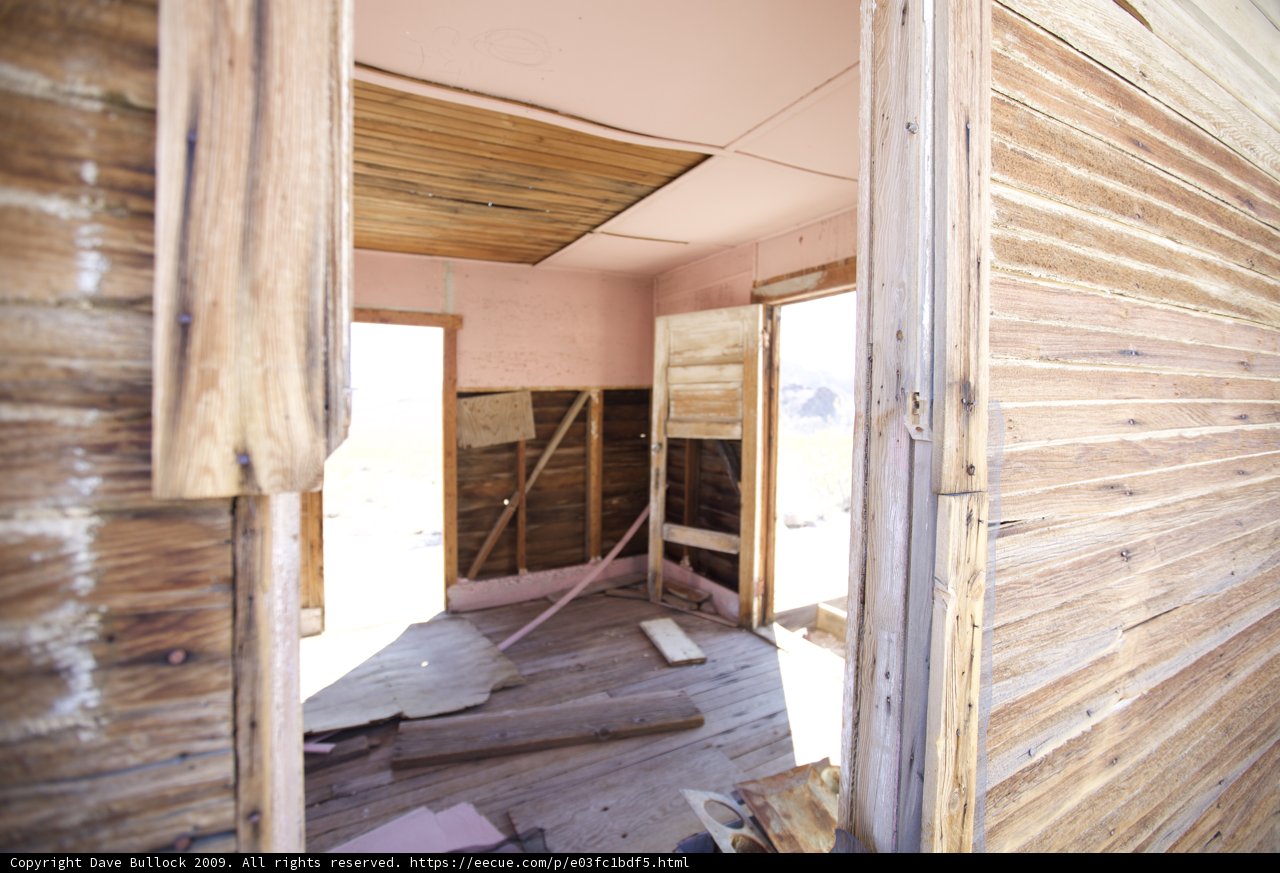 Wood Paneled Room with Open Door
