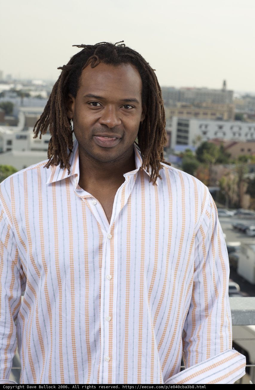 Smiling Portrait of James M with Dreadlocks