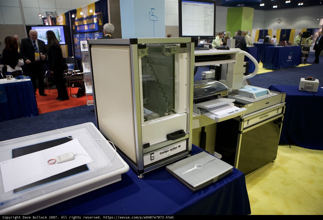 Blue Table with Computer and Printer