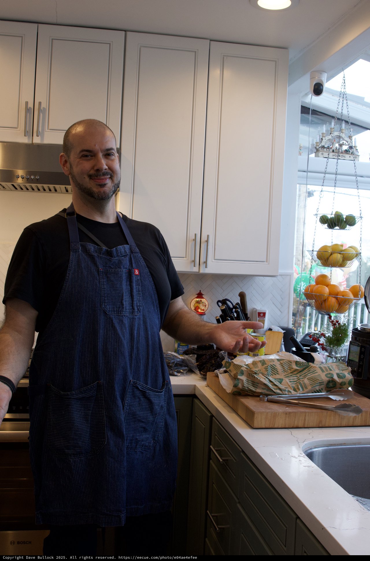 Home Chef Preparing Christmas Eve Dinner in Modern Kitchen