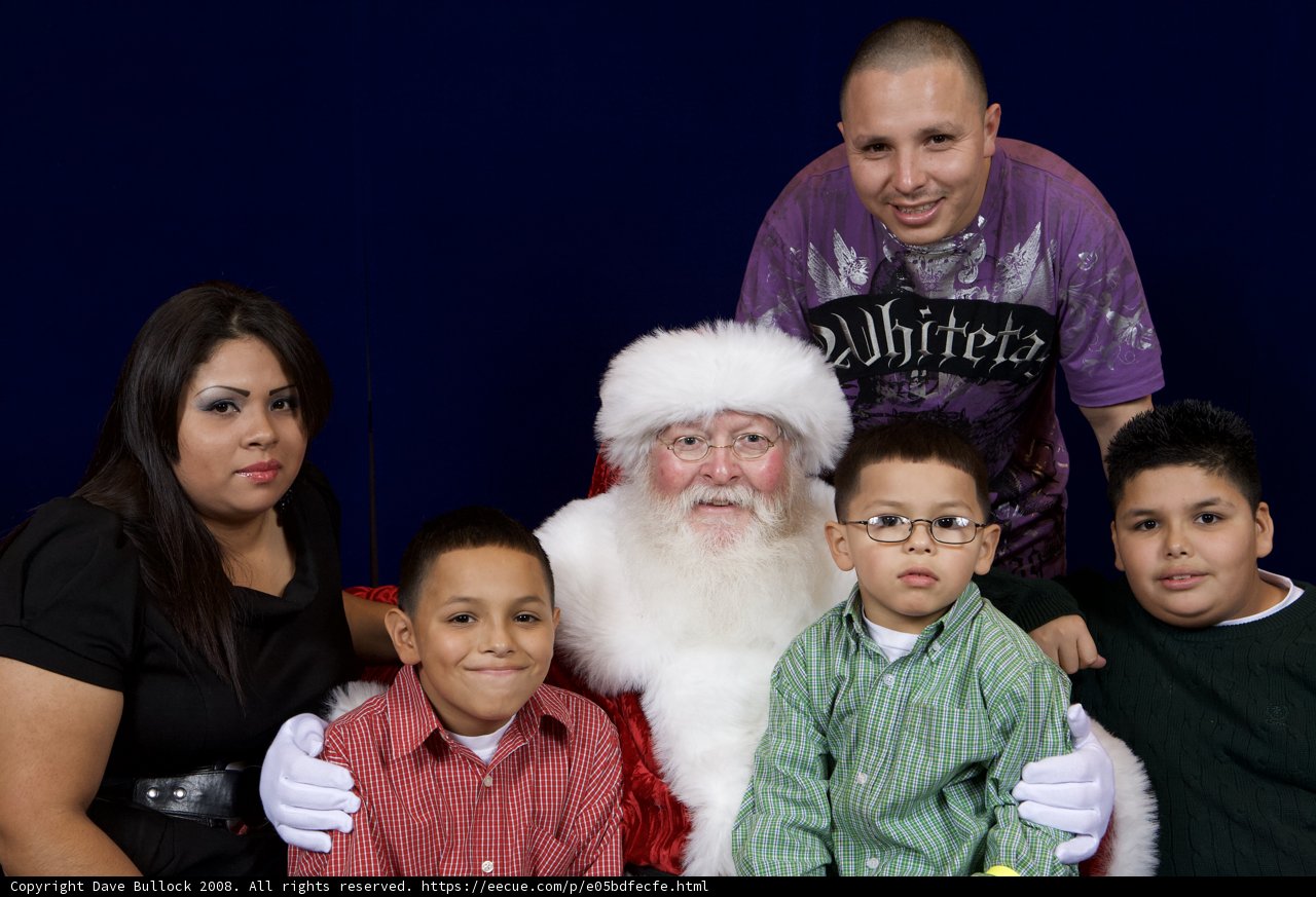 A Festive Family Portrait with Santa Claus