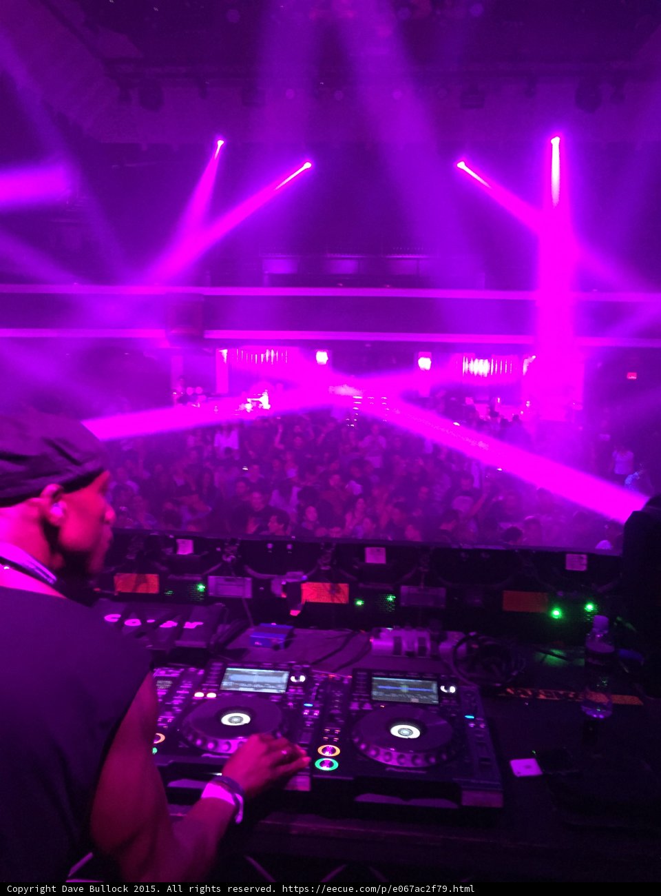 Pink Beams Over the Crowd
