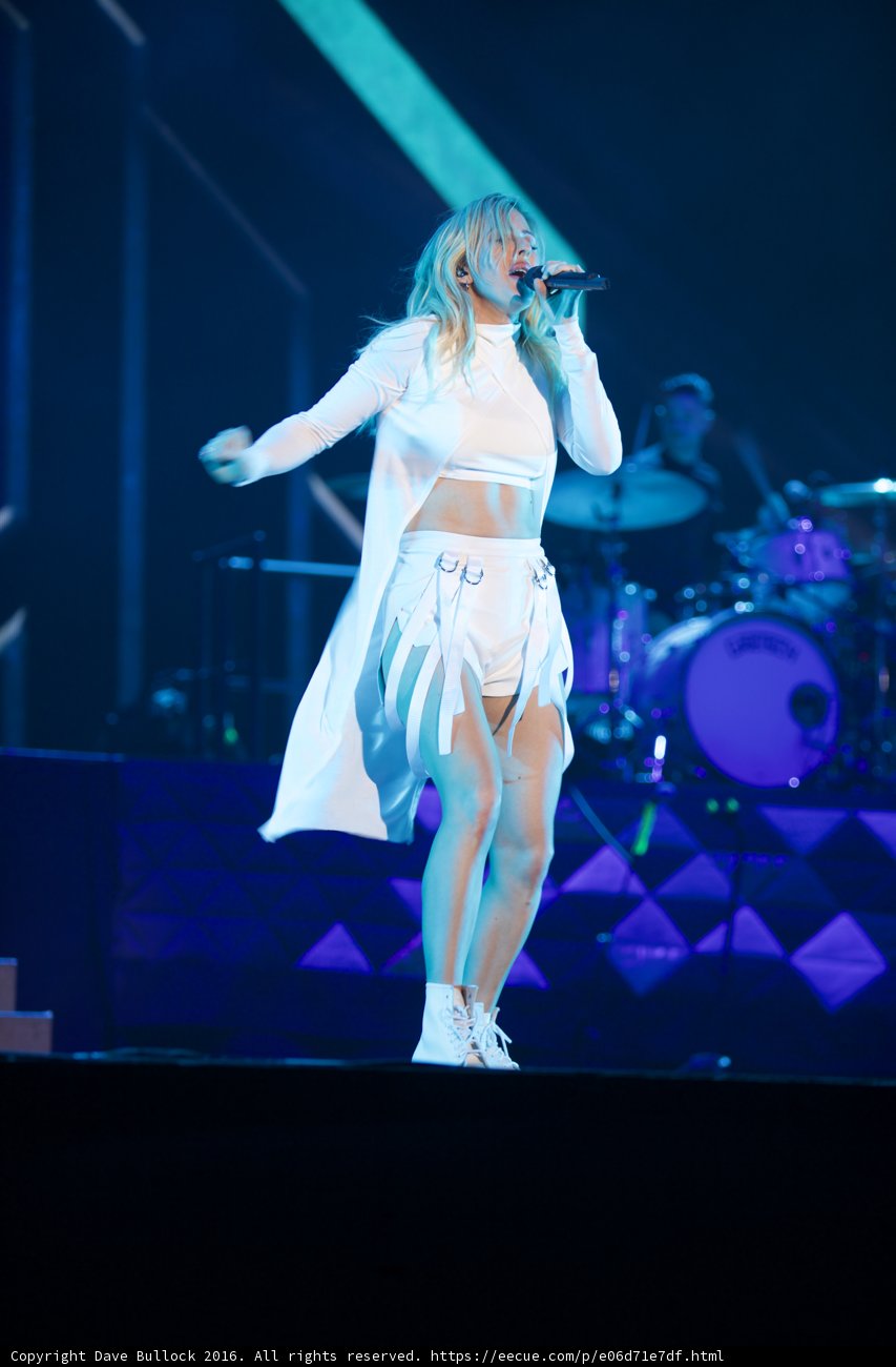 Woman in White Lights Up Coachella Stage