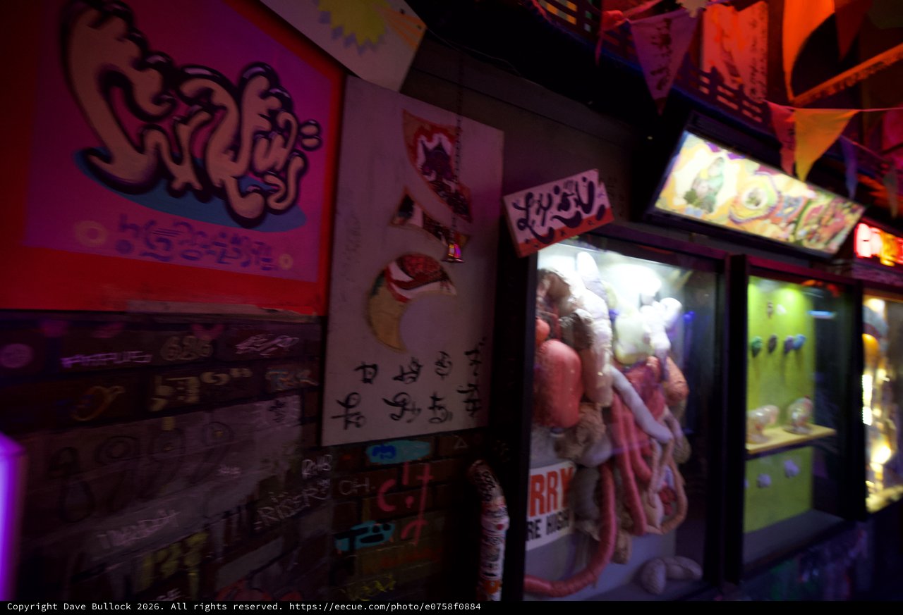 Retro Japanese Arcade Claw Machines and Graffiti Art