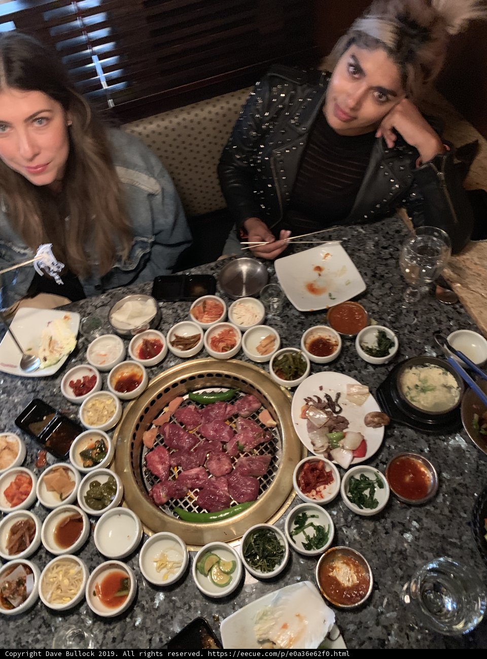 Enjoying a Delicious Meal at a Restaurant with Friends
