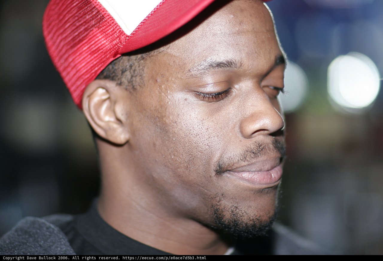 The Red-Capped Smiling Man