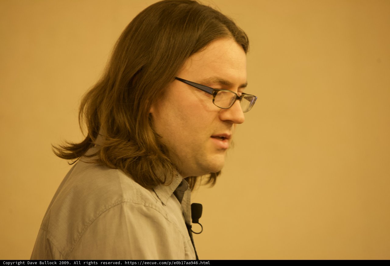 Portrait of a Long-Haired Man with Glasses