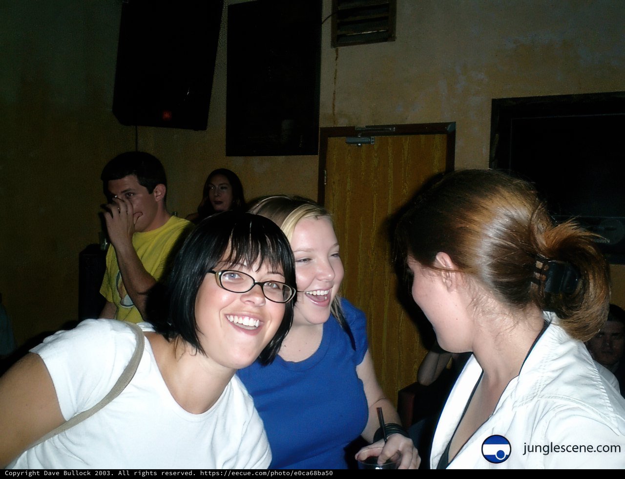 Three Friends Share a Laugh
