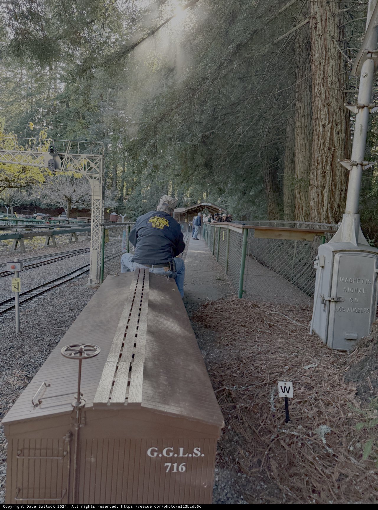 Railway Worker on Historic Train Platform