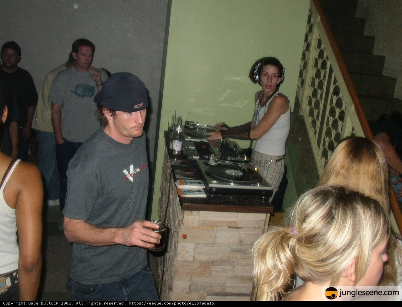 DJ Drops Beats with Stylish Entertainer by His Side
