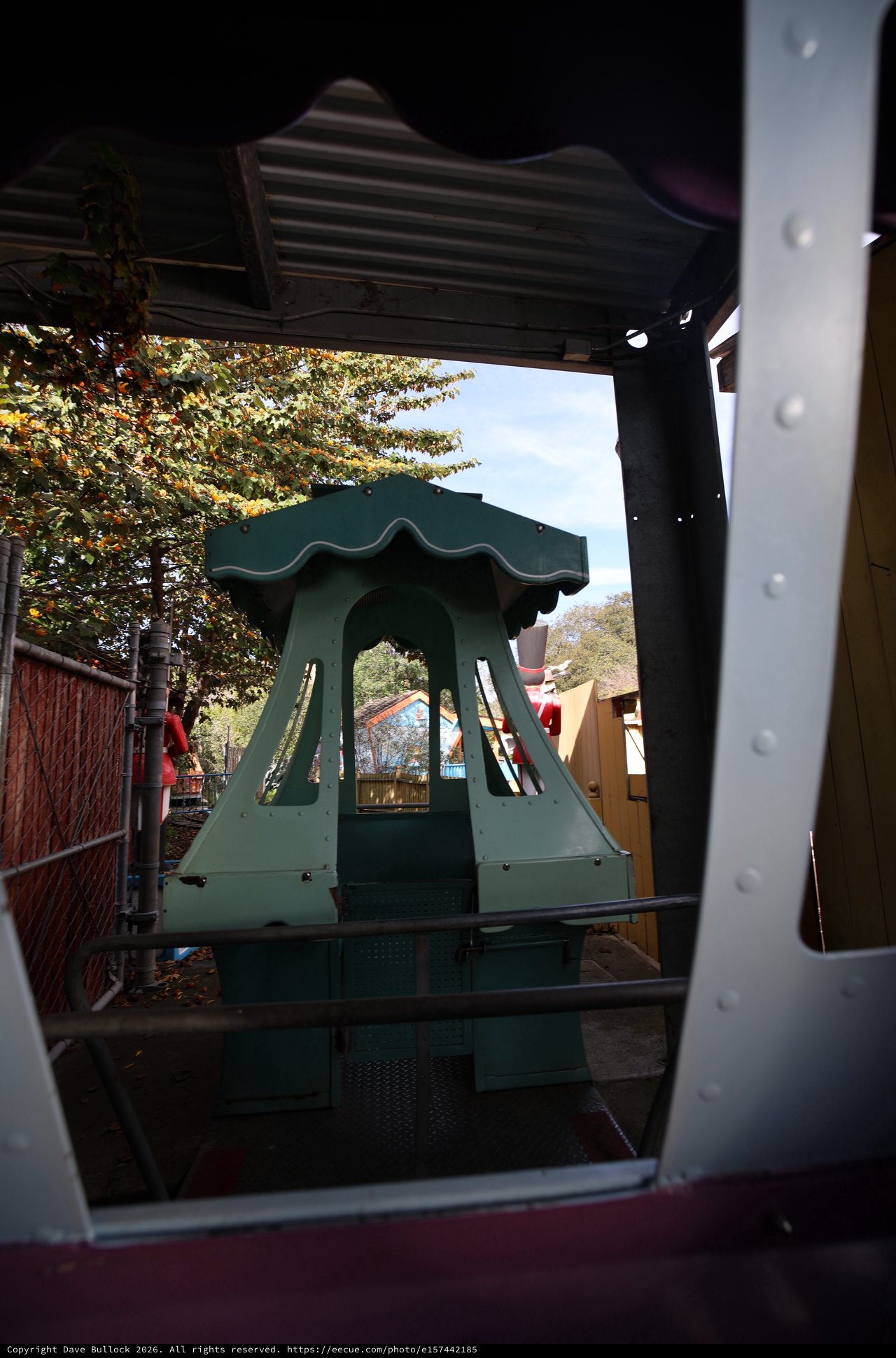 Pagoda Ride Structure Framed Through Metal Doorway