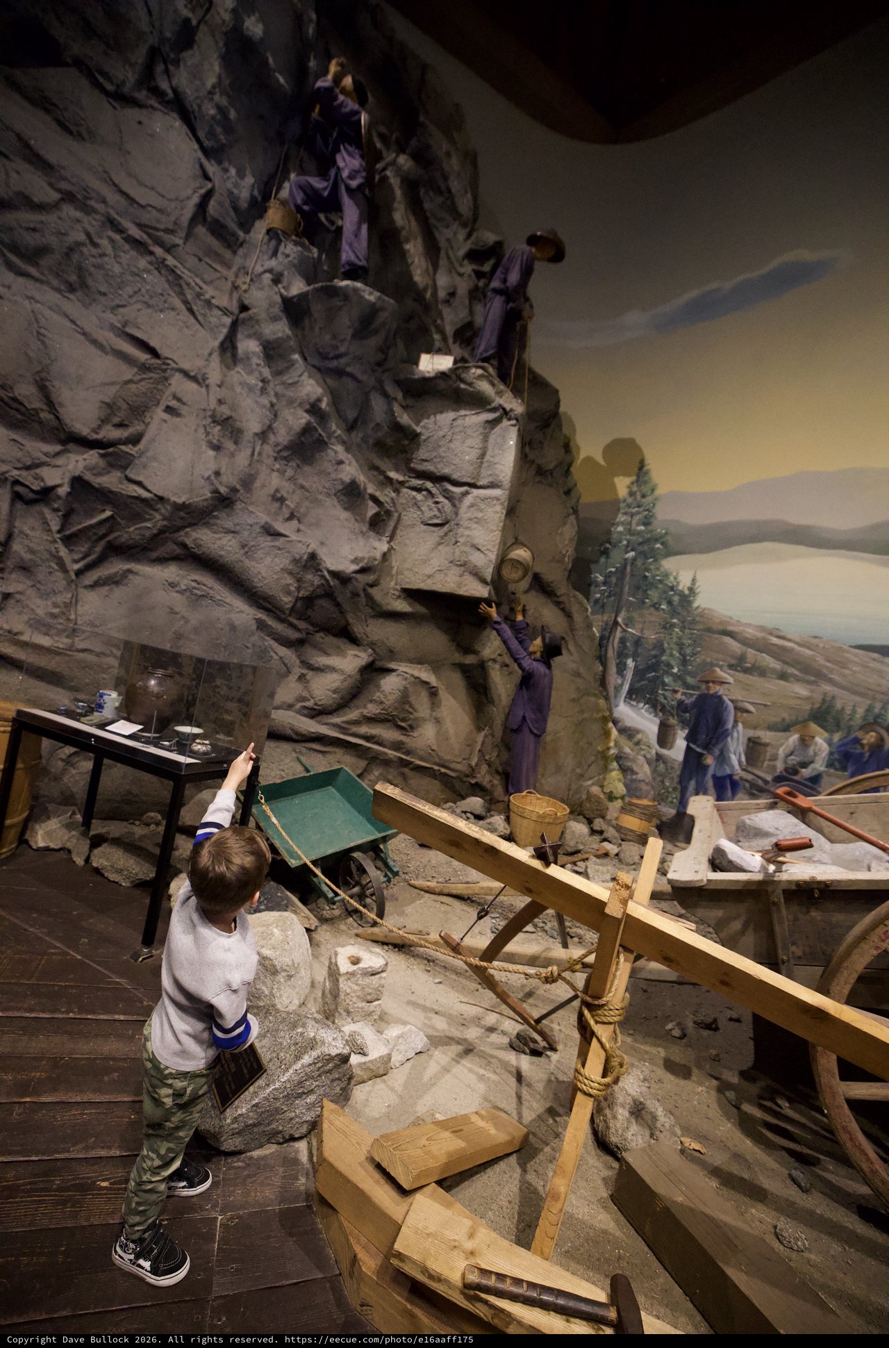 Child Exploring Interactive Museum Mining Exhibit Display