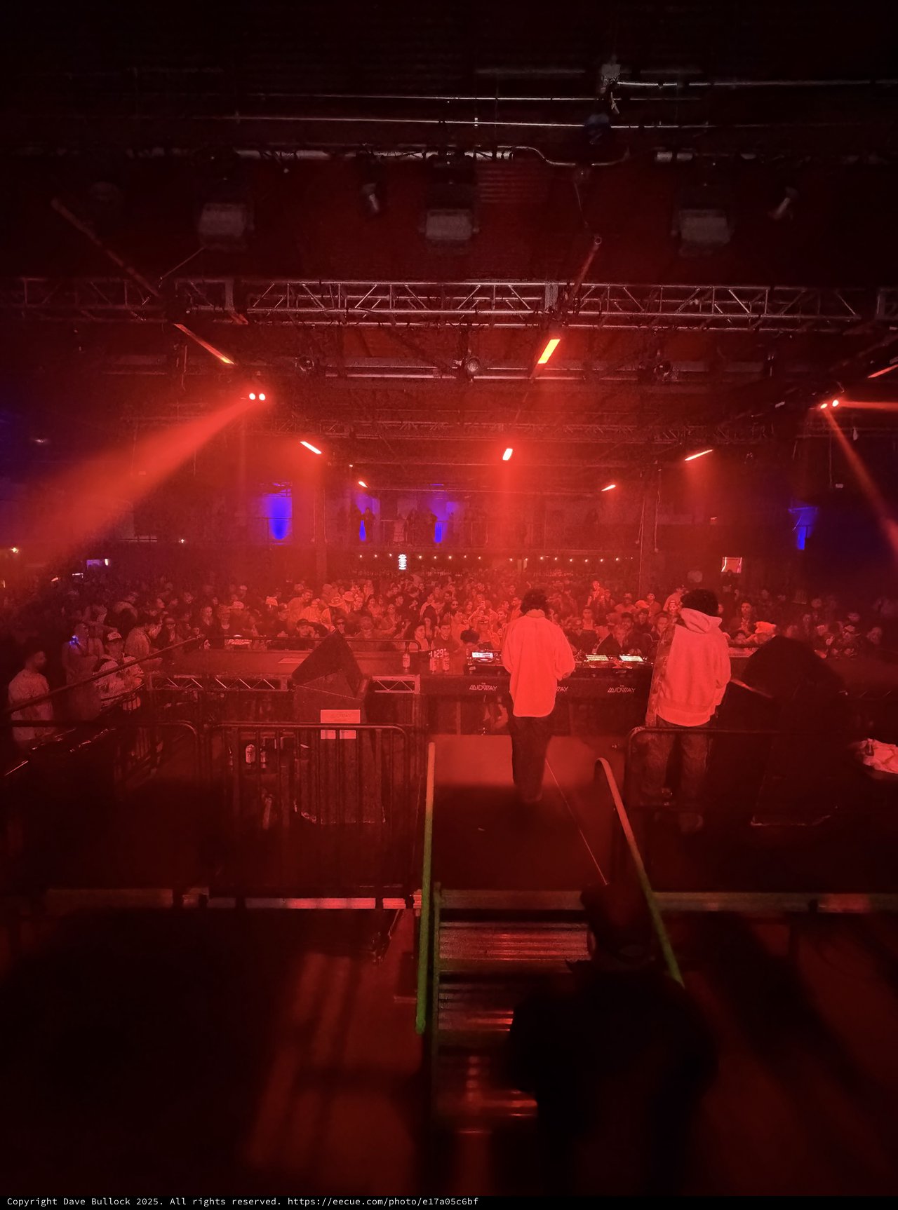 Electronic Music Performance with Red Stage Lighting