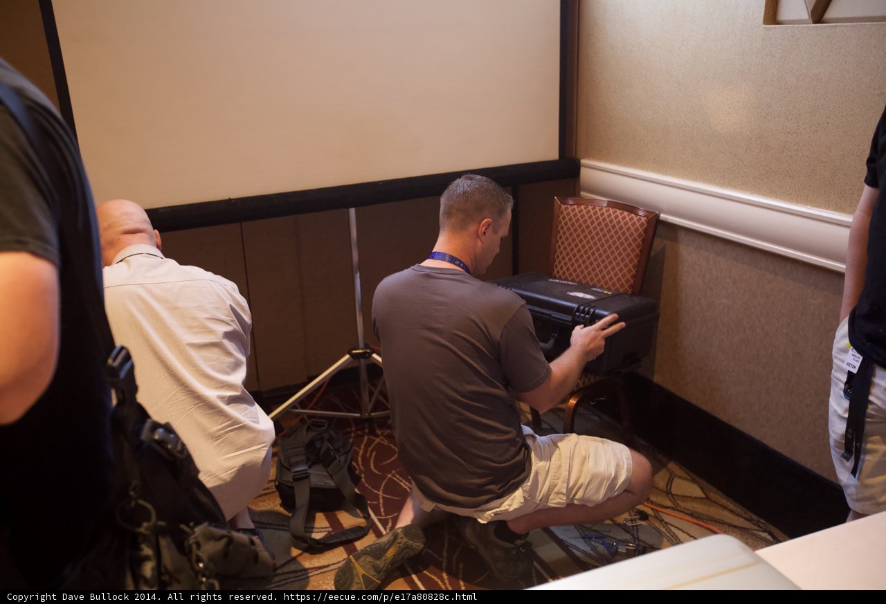 Man Sitting on a Chair and Working on a Laptop