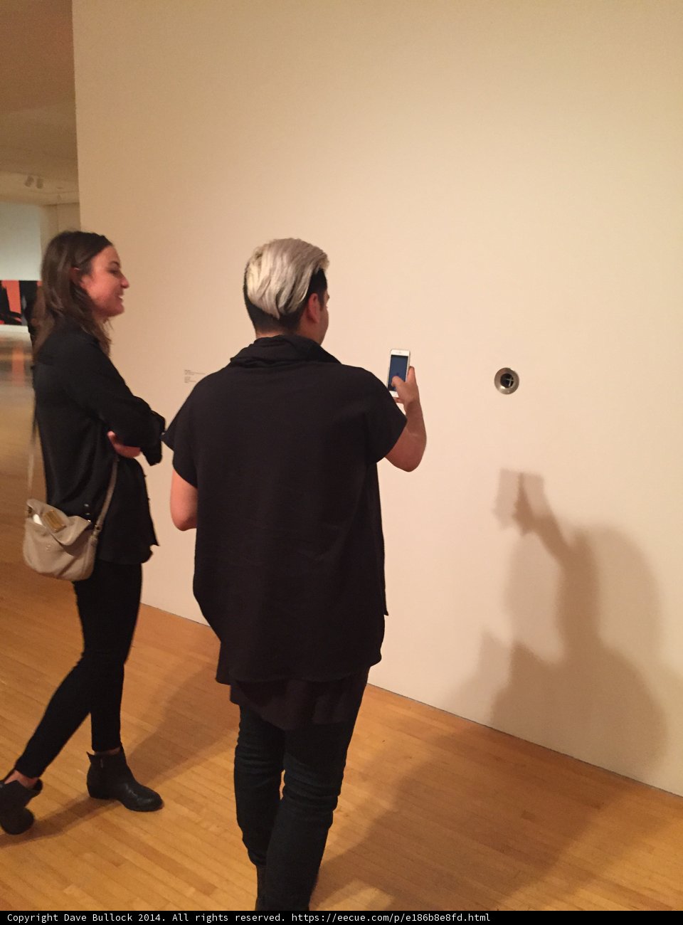 Two Individuals in the Art Gallery