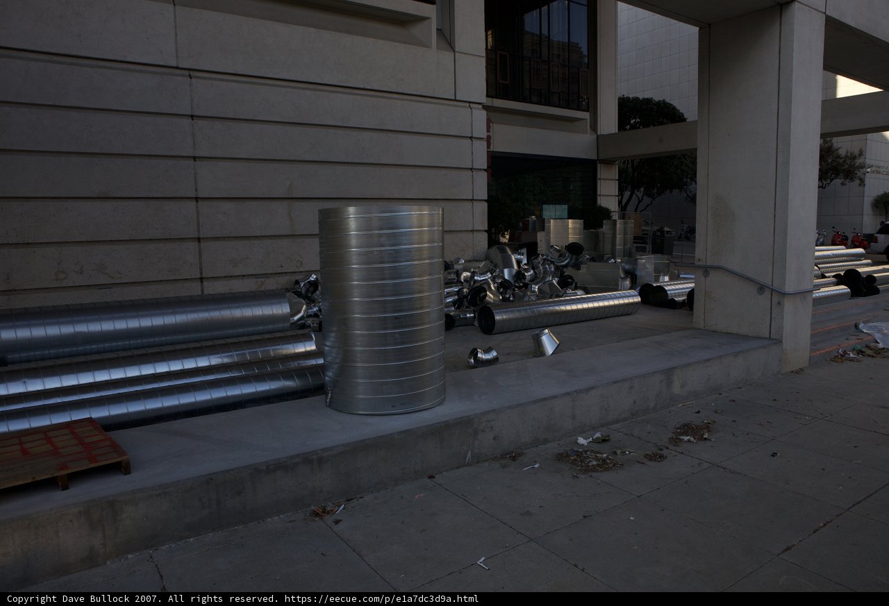 Abandoned Metal Pipe on the Sidewalk