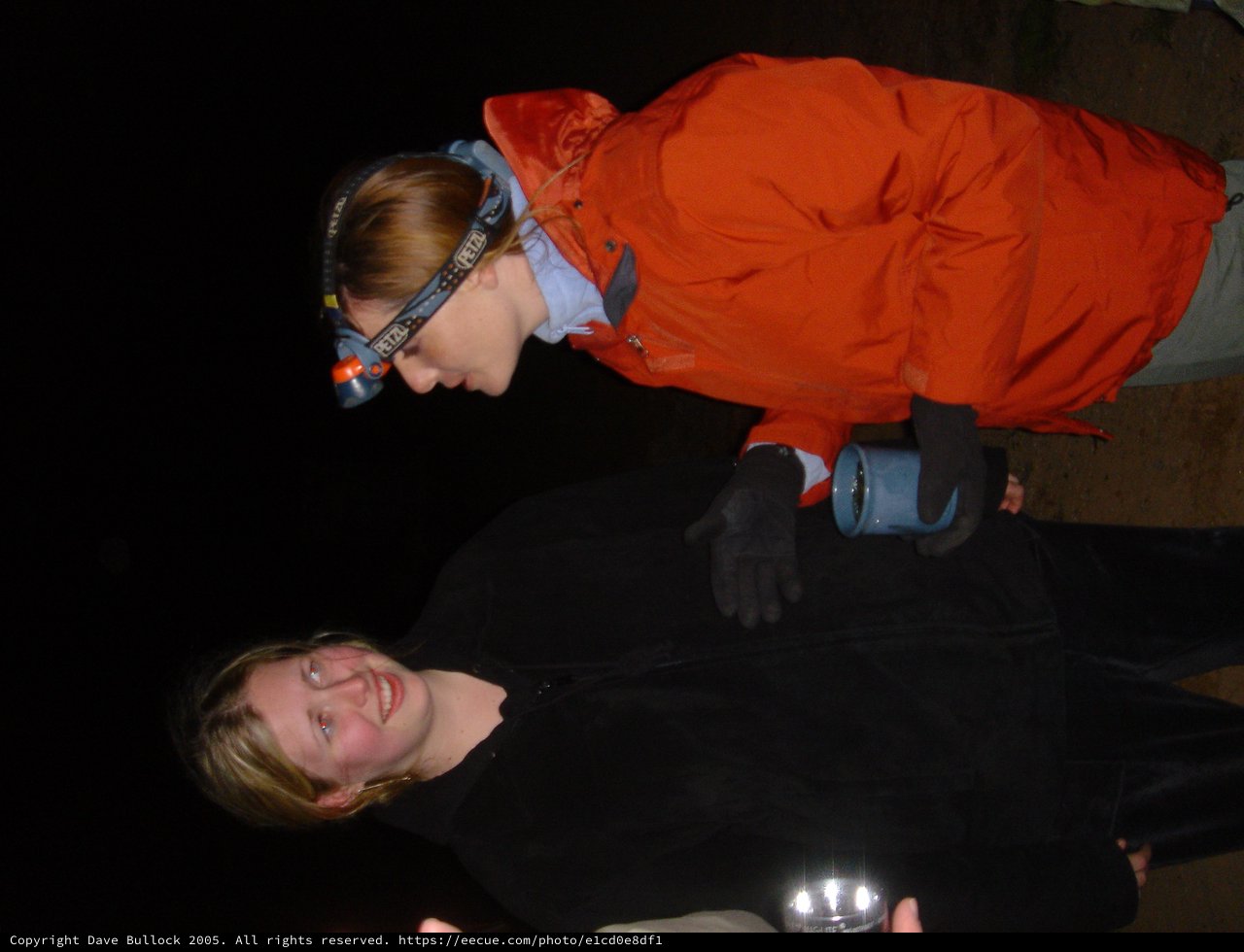 Cave Explorers Share a Laugh in the Dark