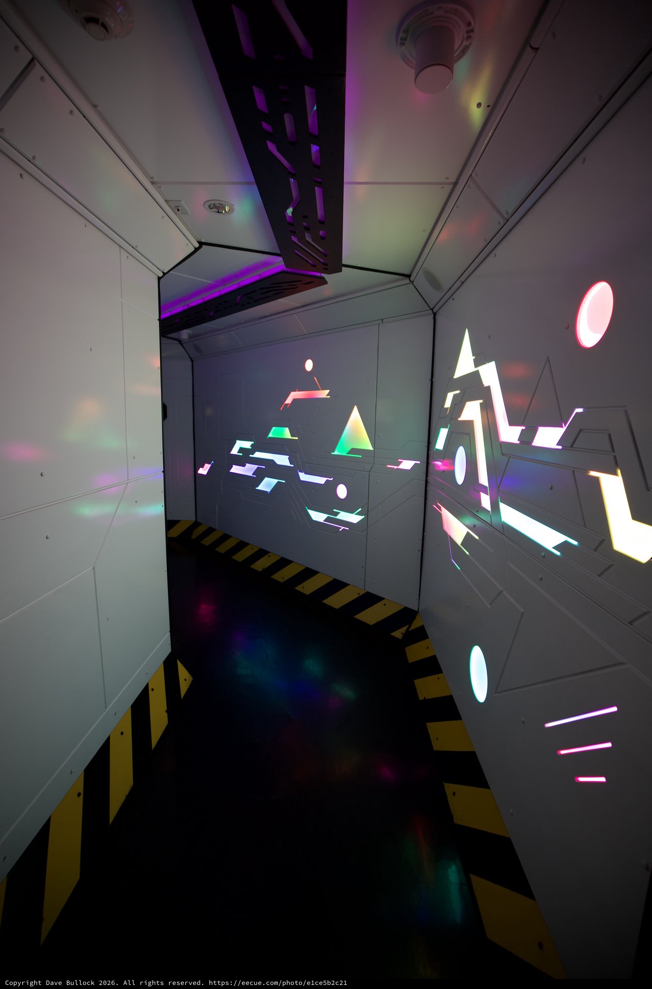 Futuristic Sci-Fi Corridor with Geometric Light Projections