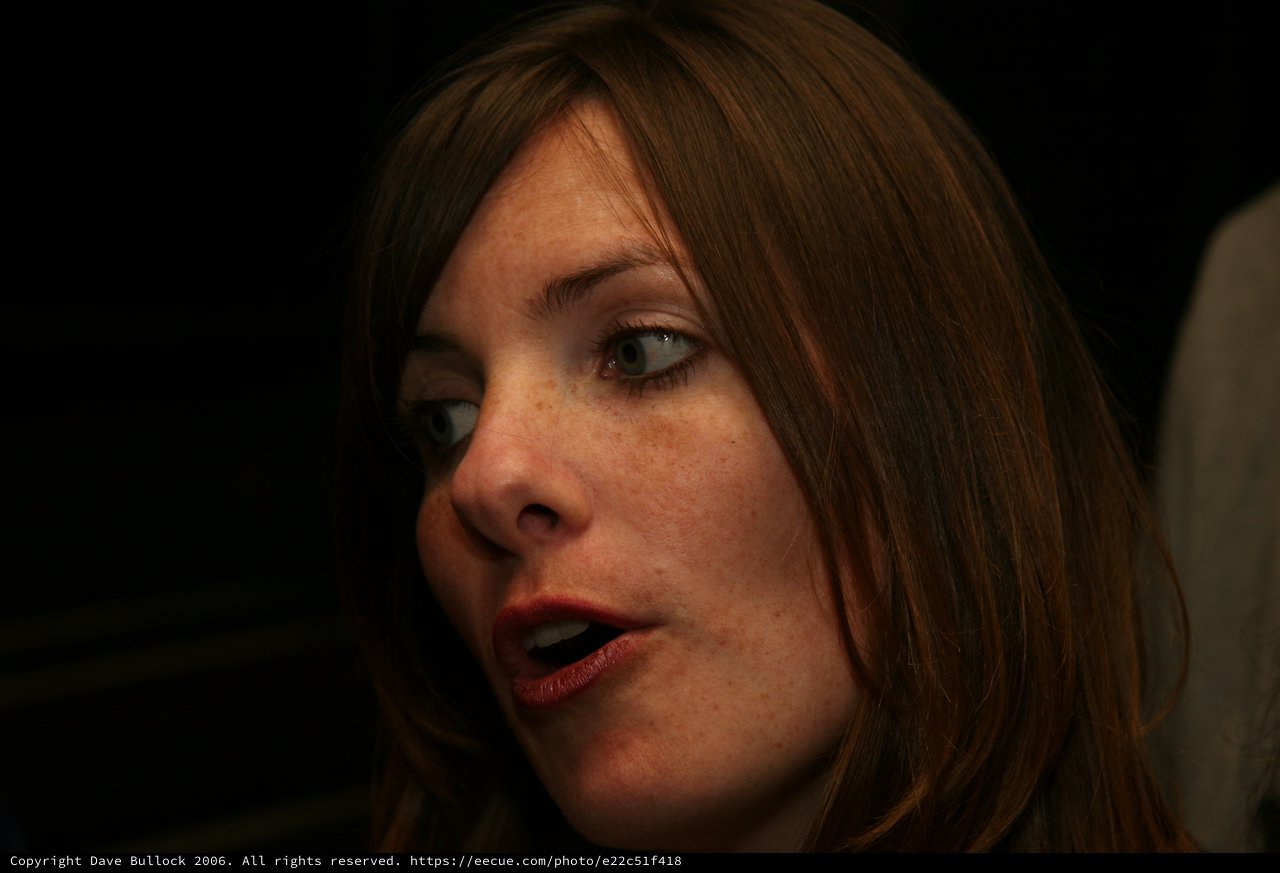 Penelope Speaking Candidly in Dramatic Low Light